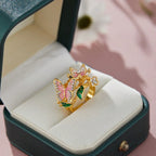 Anillo ajustable flor de cerezo y mariposa oro