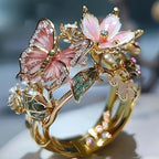 Anillo ajustable flor de cerezo y mariposa oro