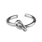 Anillo ajustable con nudo plateado