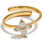Anillo ajustable trébol y strass oro