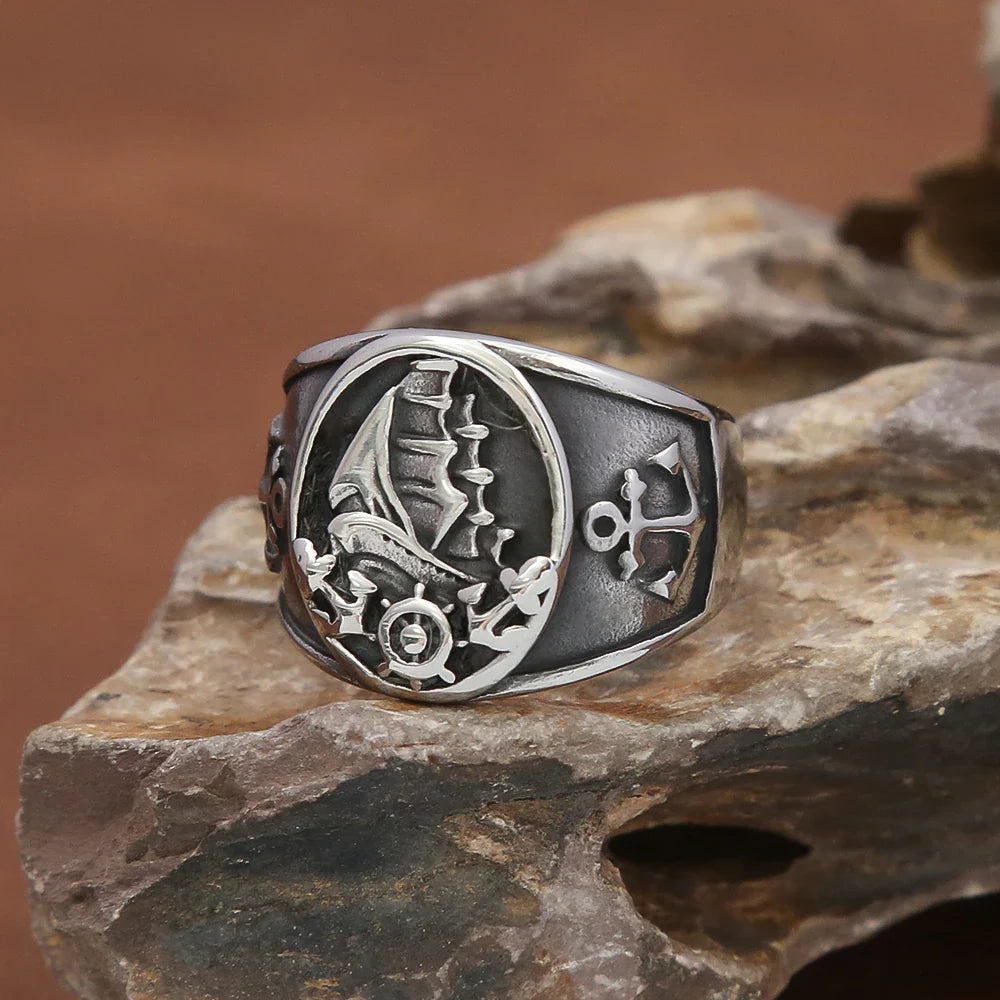 Anillo ancla y barco