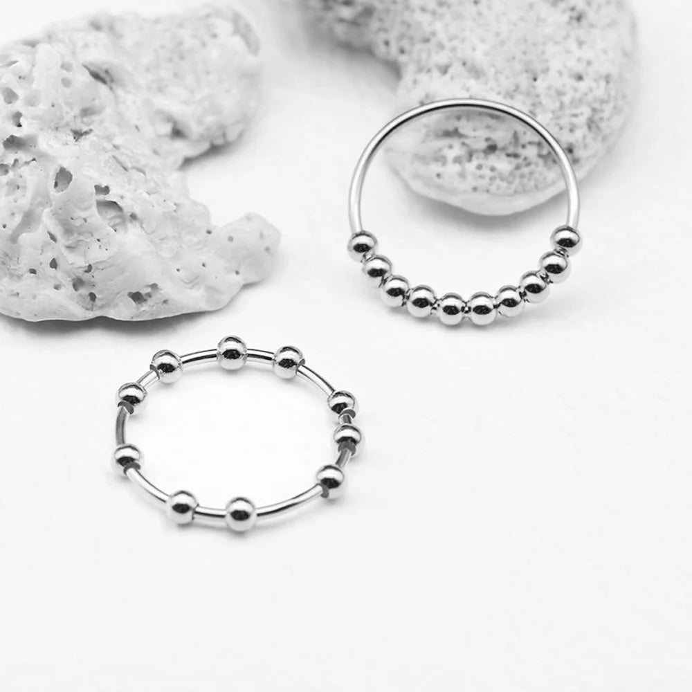 Anillo Antiestrés con Perlas Giratorias para Hombre o Mujer plata