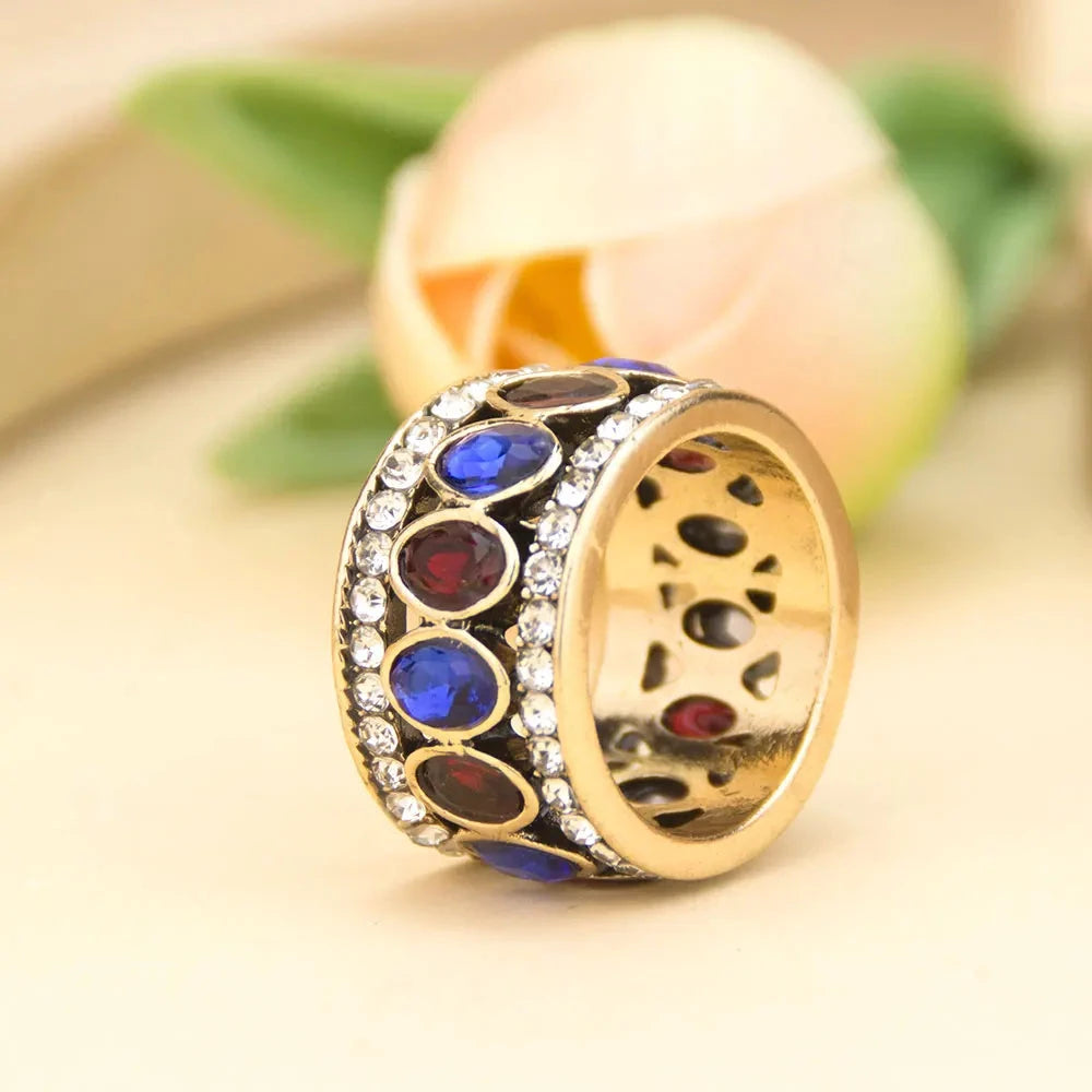 Anillo étnico de estilo oriental azul y rojo