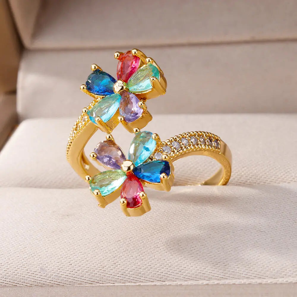 Anillo de flores de colores en circonio oro