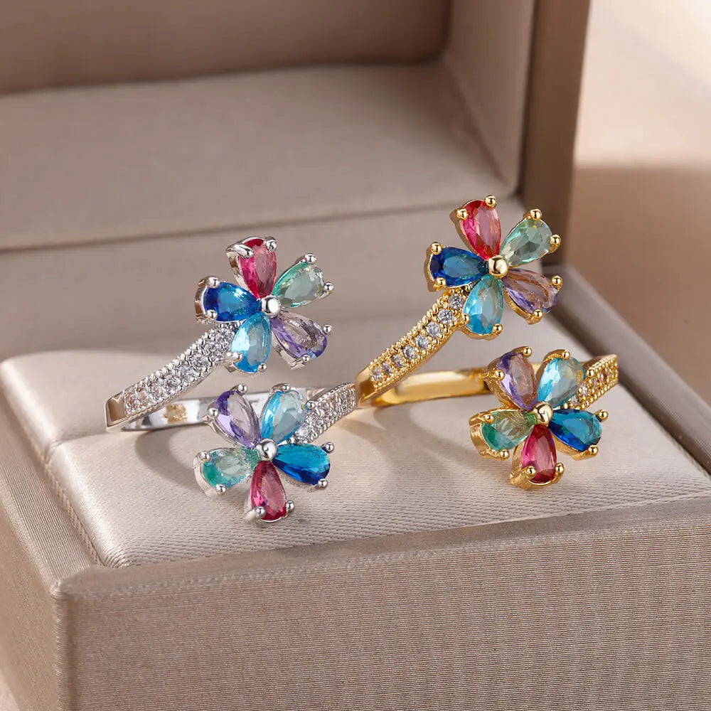 Anillo de flores de colores en circonio plata
