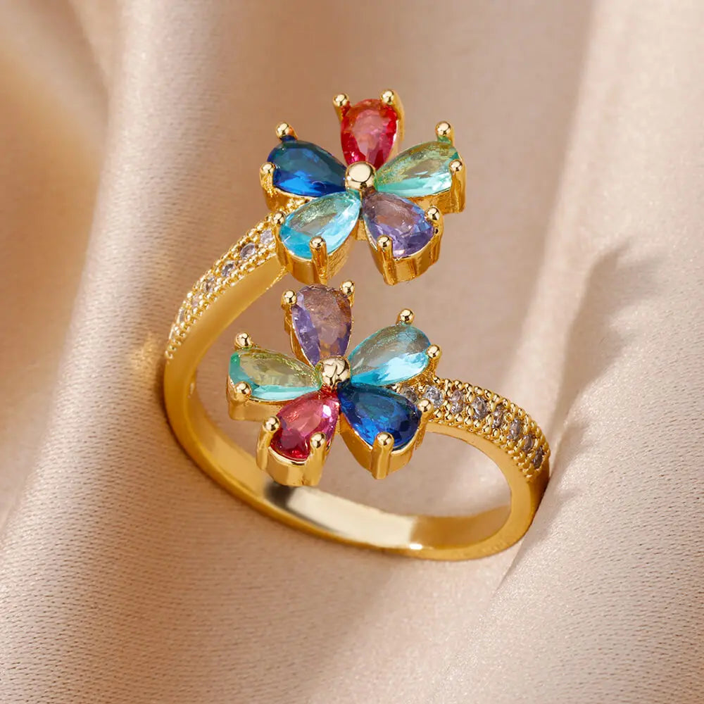 Anillo de flores de colores en circonio oro