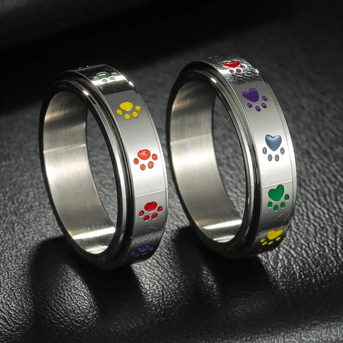 Anillo con corazones o patas anti-estrés giratorias patas