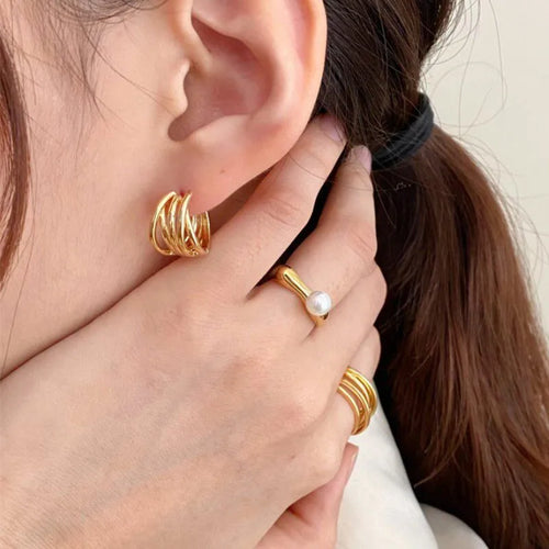 Anillo para mujer con perla blanca de oro