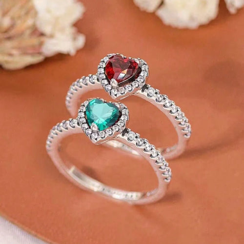 Anillo con corazón y circonio verde y plata