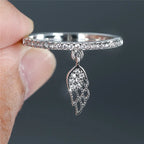 Anillo con colgante de alas de ángel plata