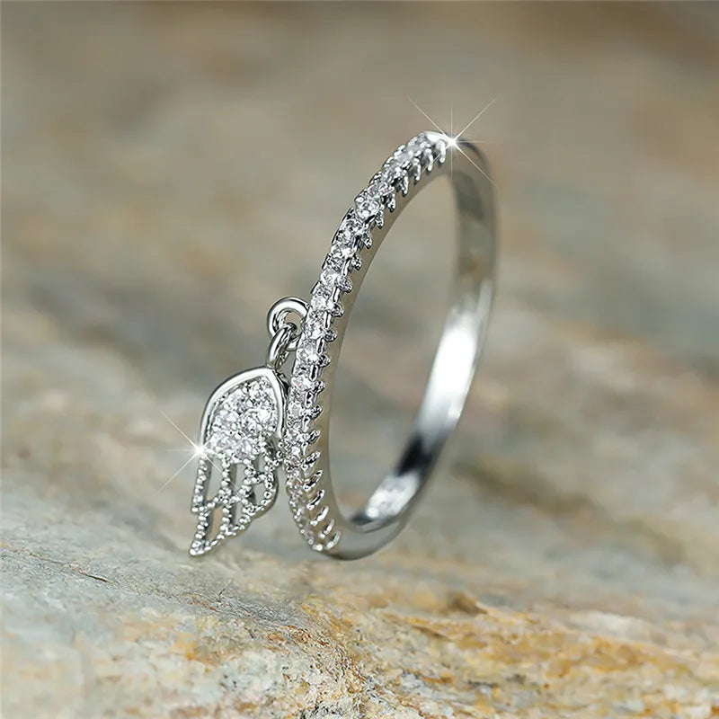 Anillo con colgante de alas de ángel plata