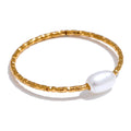 Anillo con perla de agua dulce oro