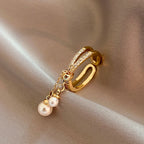 Anillo con perlas colgantes