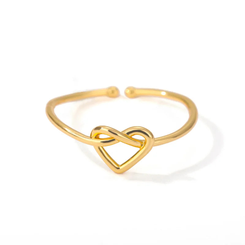 Anillo de corazón entrelazado oro