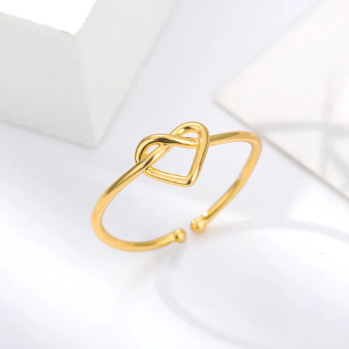 Anillo de corazón entrelazado oro