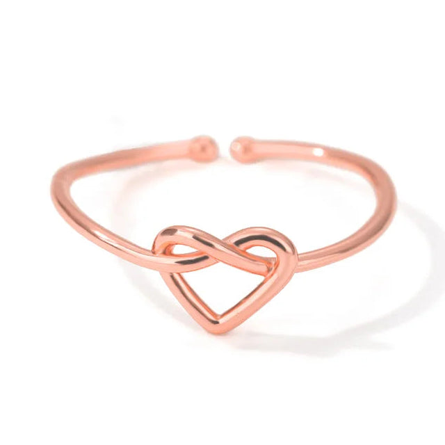 Anillo de corazón entrelazado oro rosa