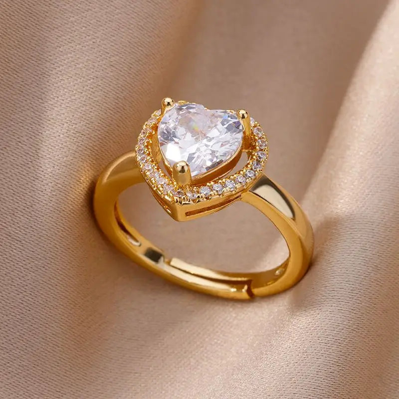 Anillo corazón brillante de oro