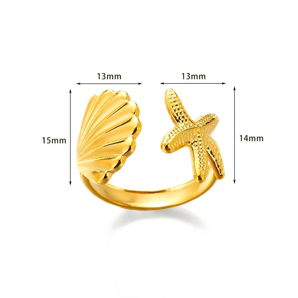 Anillo con concha y estrella de mar
