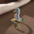Anillo con concha y caballito de mar