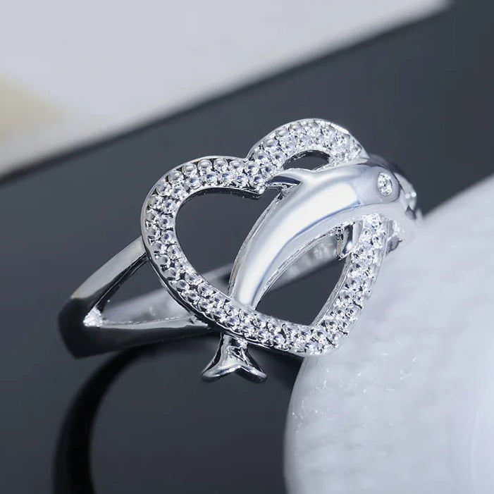 Anillo delfín y corazón