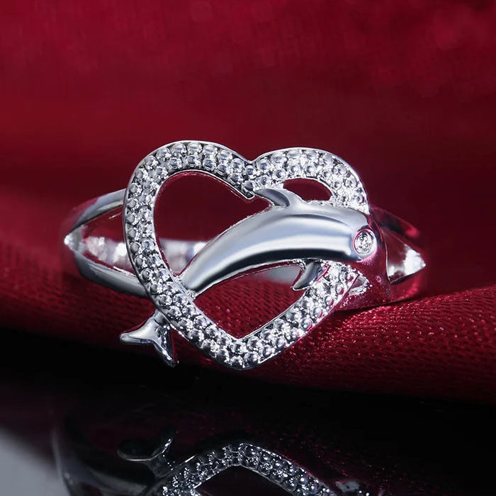 Anillo delfín y corazón