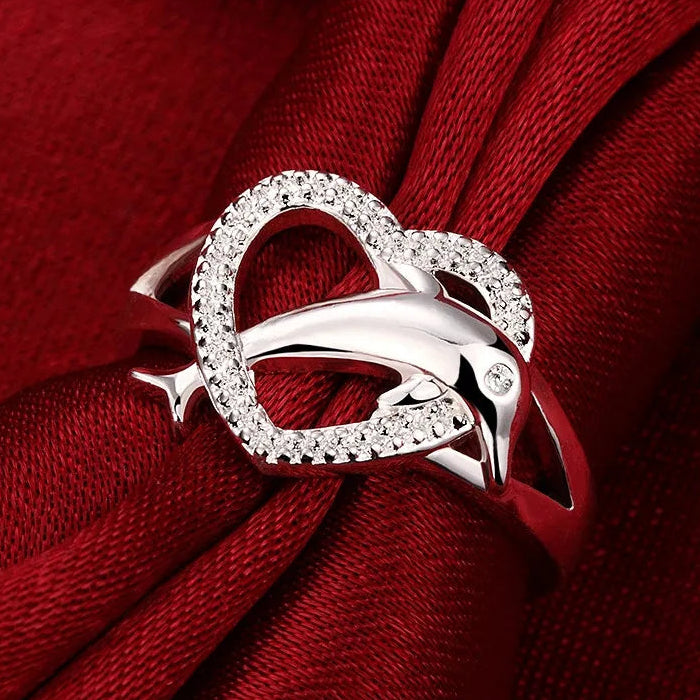 Anillo delfín y corazón