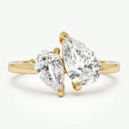 Slim ring with double crystal teardrop in gold
