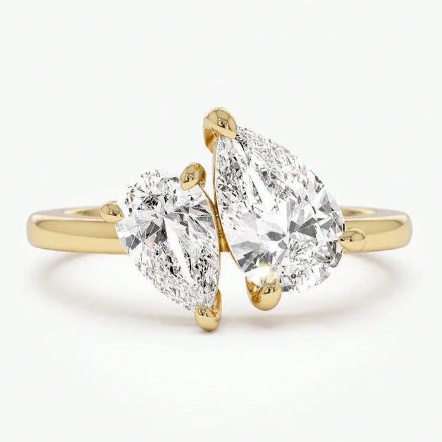 Slim ring with double crystal teardrop in gold