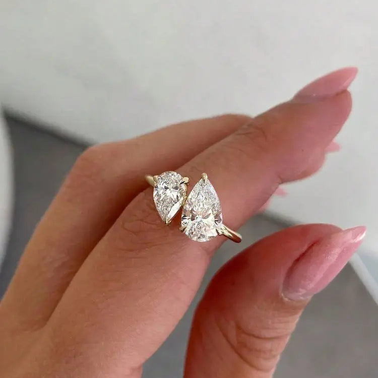 Slim ring with double crystal teardrop in gold