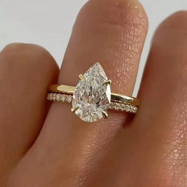 Slim ring with large teardrop crystal gold