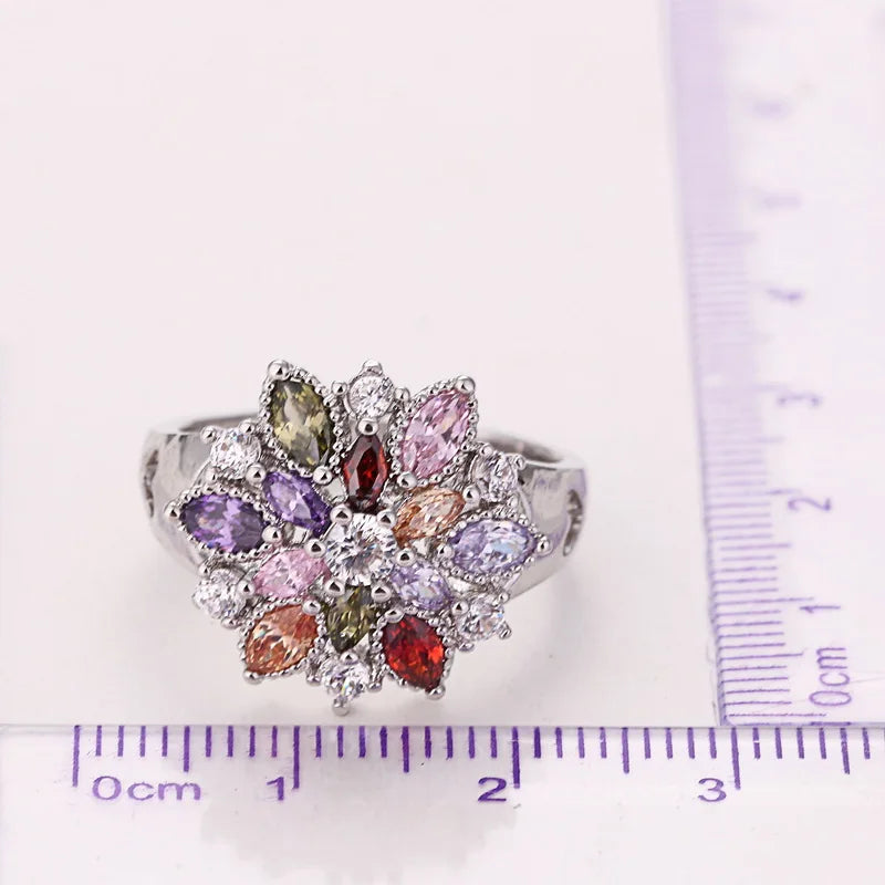 Anillo flor con cristales multicolores