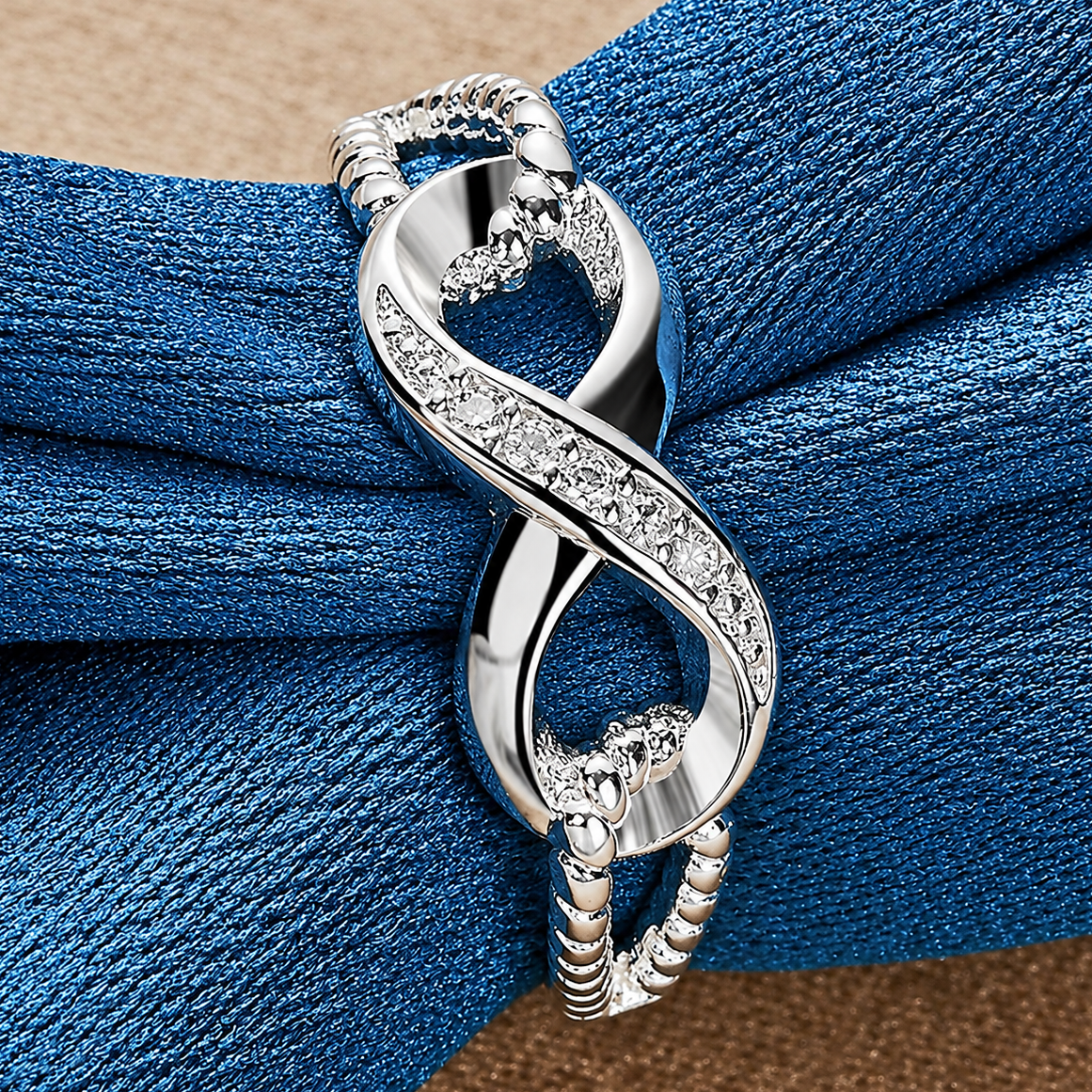 Majestic infinity ring set with crystal