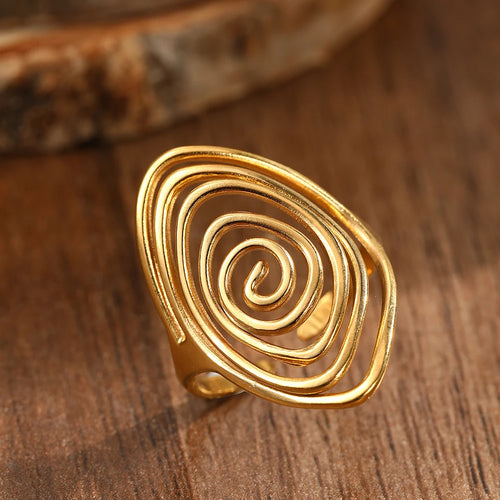 Anillo ancho con forma de espiral texturizada dorado