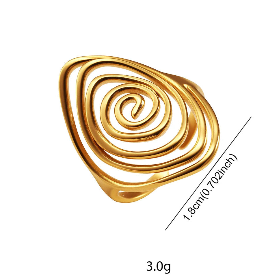 Anillo ancho con forma de espiral texturizada
