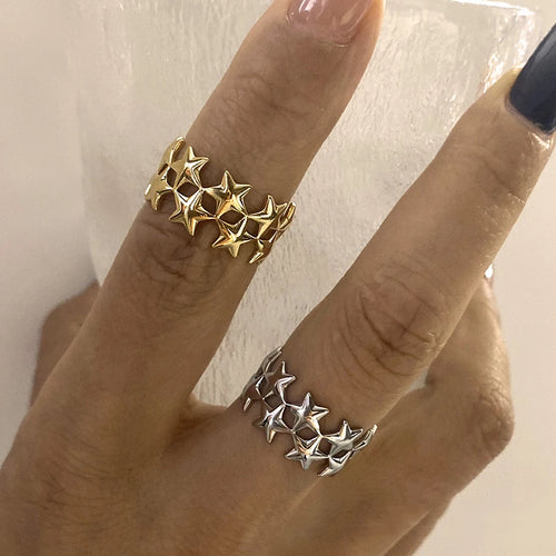 Wide multi-star gold ring