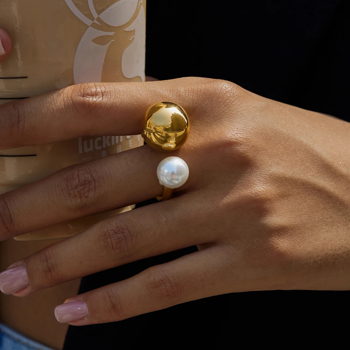 Anillo abierto con doble perla