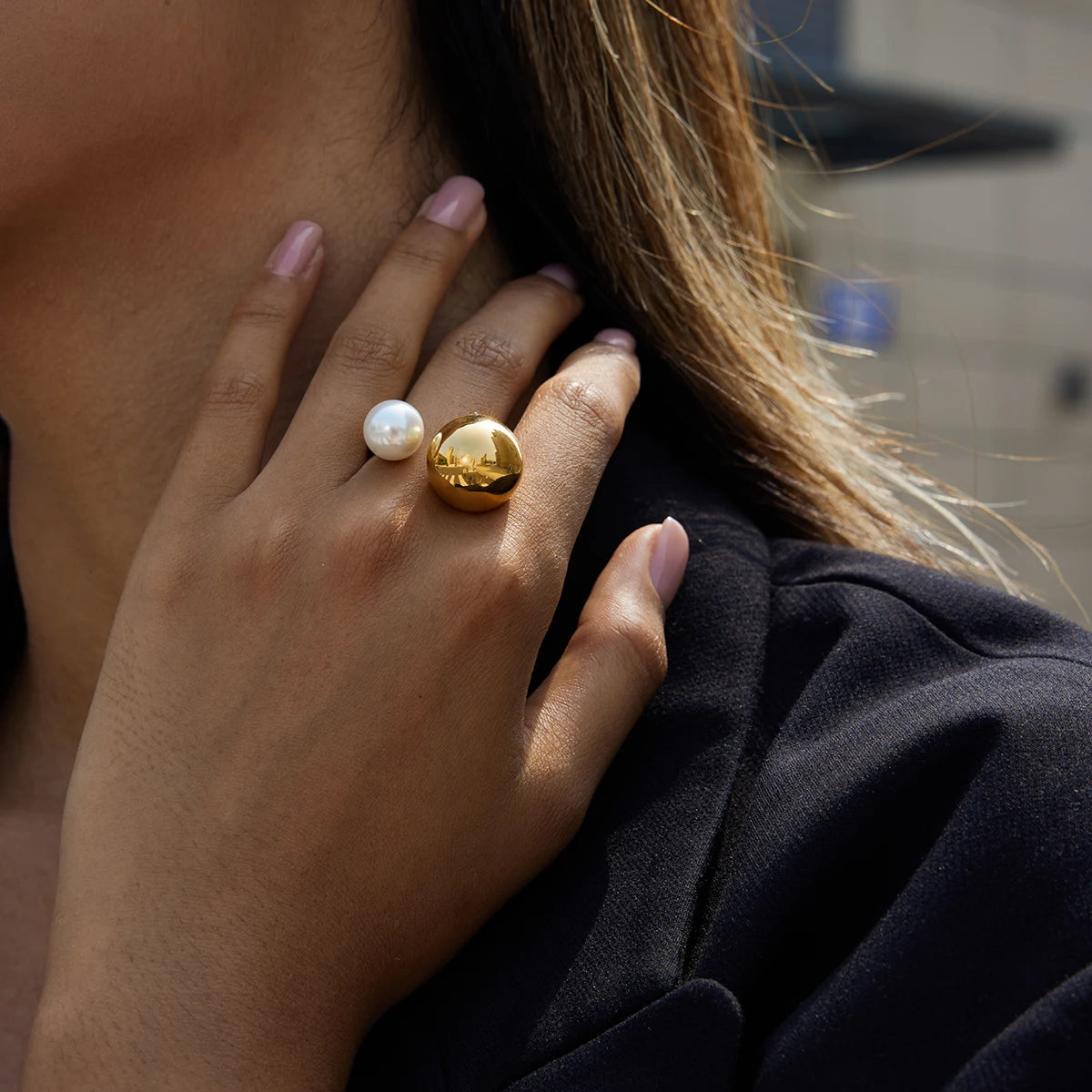 Anillo abierto con doble perla