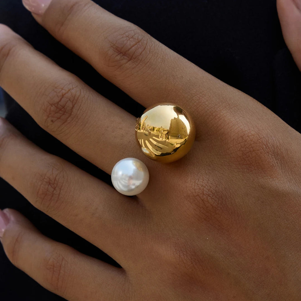 Anillo abierto con doble perla