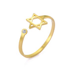 Anillo abierto con la <span data-glossary-id="etoile-de-david">estrella de David</span> simbólica judía oro