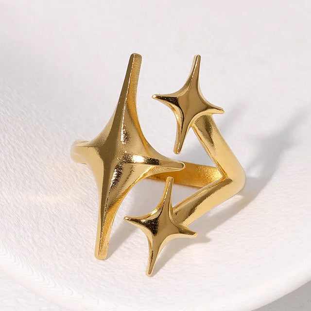 Anillo abierto doble estrellas oro