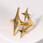 Anillo abierto doble estrellas oro