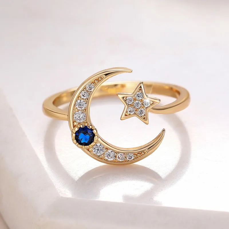 Anillo abierto "noche estrellada" media luna y su cristal azul