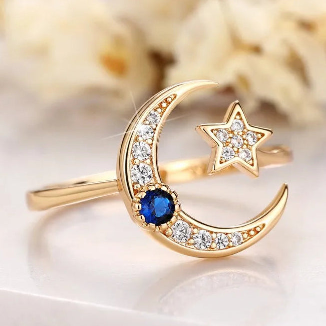 Anillo abierto "noche estrellada" media luna y su cristal azul