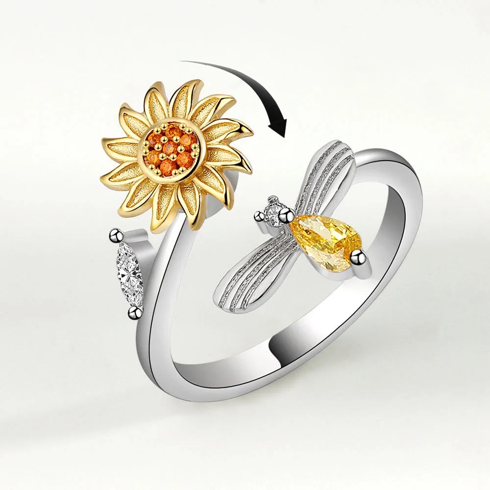 Anillo abeja y flor giratoria