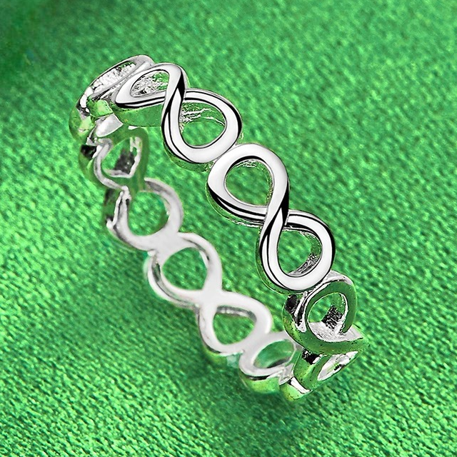Intertwined infinity symbols ring