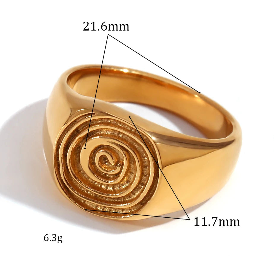 Anillo tipo sello con motivo de espiral grabado