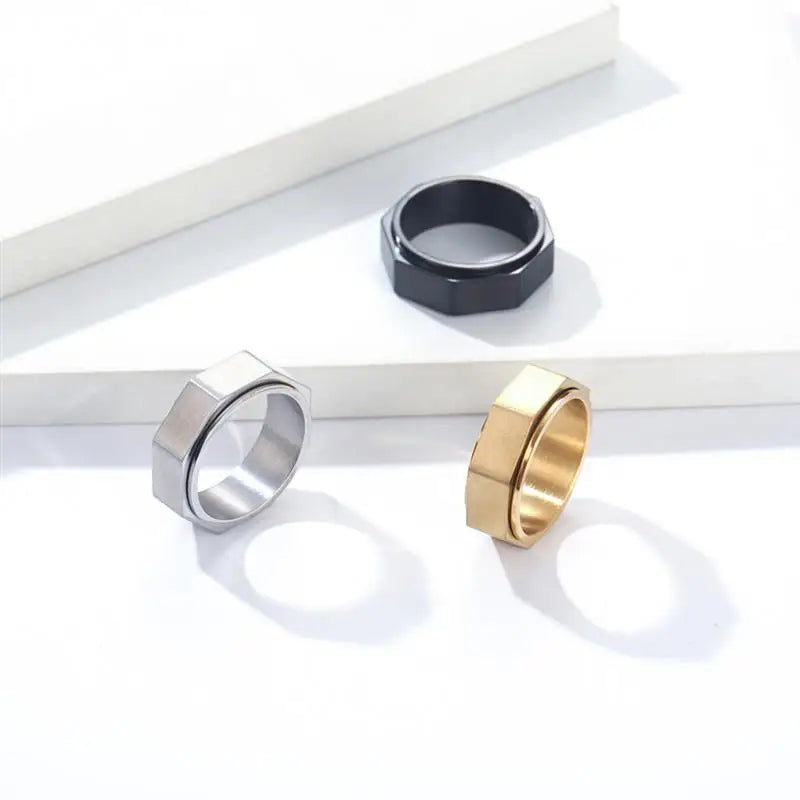 Bague unisexe anti-stress rotative hexagonale