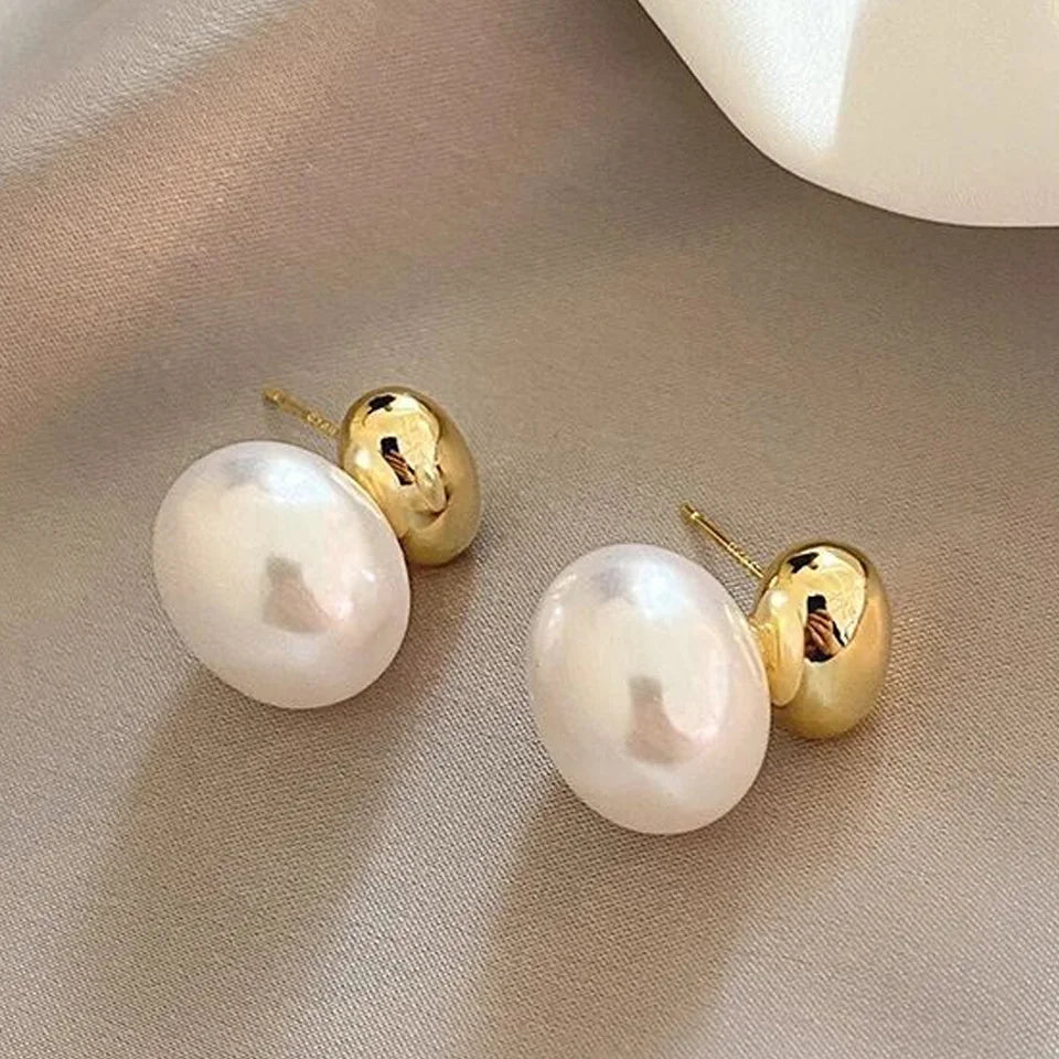 Pendientes con doble perla dorada