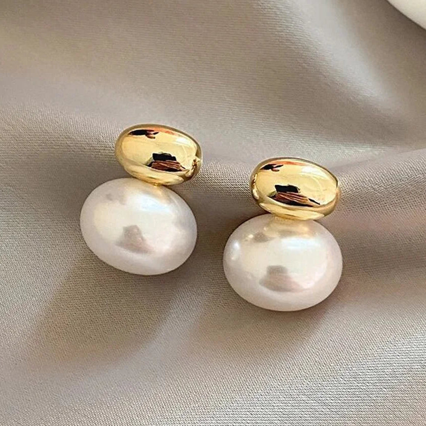 Pendientes con doble perla dorada
