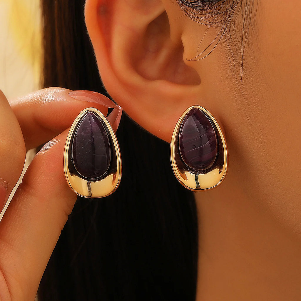 Pendientes con silueta de gota de agua violeta
